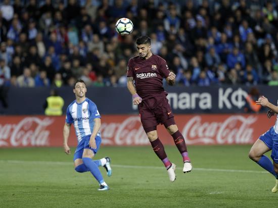 Malaga 0 - 2 Barcelona: Barcelona move 11 points clear atop LaLiga after easing past 10-man Malaga