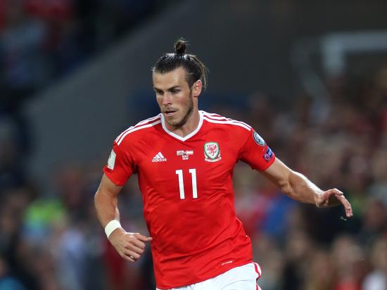 Bale hits hat-trick and claims record as Wales thrash China