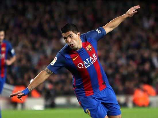 Barcelona 2 - 1 Valencia: Luis Suarez sets wounded Barcelona on the way to welcome win over Valencia