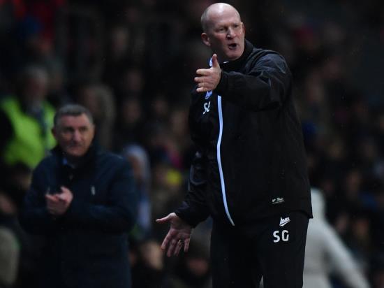 Bradford boss Simon Grayson considers his options ahead of Portsmouth clash