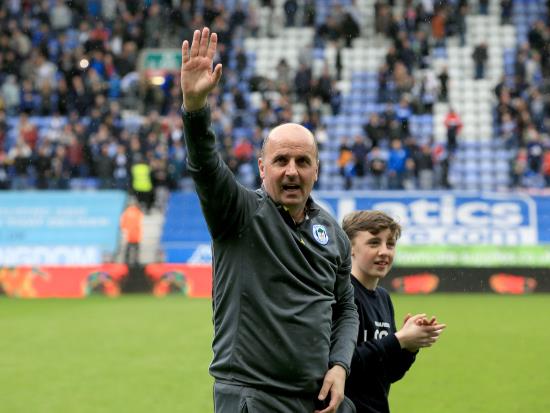 Paul Cook bemoans first-half display as Wigan are made to wait for title