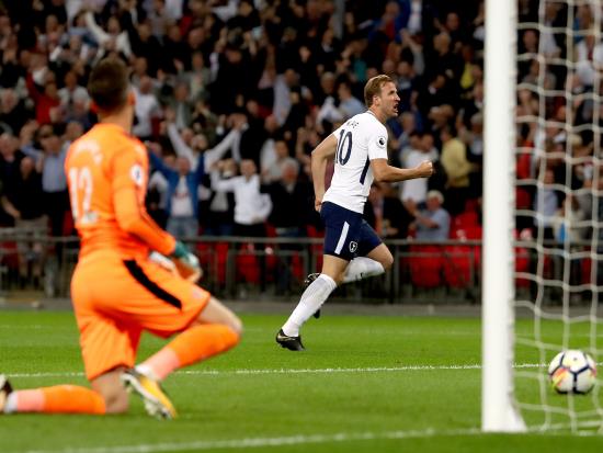 Tottenham overcome nerves to secure Champions League place