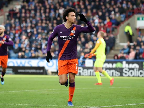 City keep pressure on Liverpool with routine win at Huddersfield