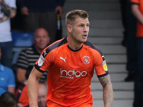 James Collins bags a brace against former club as leaders Luton win again