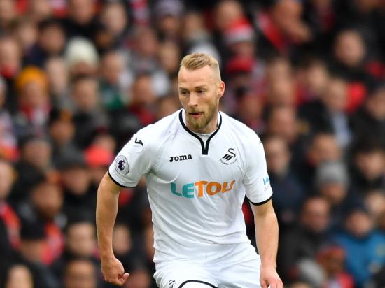 Swansea come from behind to see off Hull