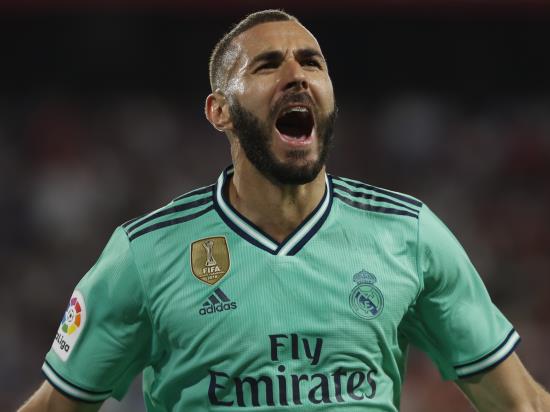 Benzema helps Real Madrid beat Sevilla to ease pressure on Zidane