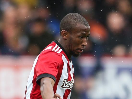Brentford ease past Wigan to climb into top half of Championship