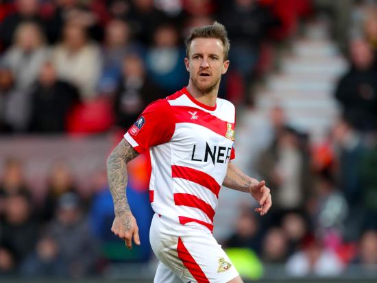 Doncaster cruise through after win over AFC Wimbledon