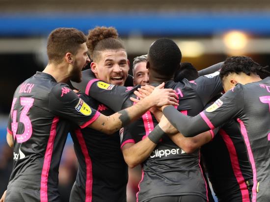 Late own goal sends Leeds top with thrilling win at Birmingham