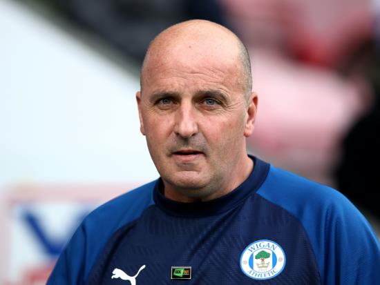 Paul Cook praises Wigan’s ‘never-say-die attitude’ following win over Blackburn