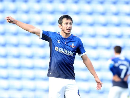 Zak Dearnley’s stoppage-time strike earns Oldham dramatic win over Bolton