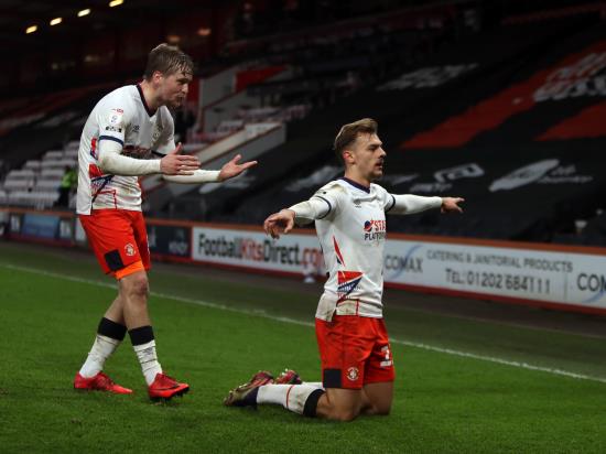 Luton climb into top half of Championship table with win at 10-man Bournemouth