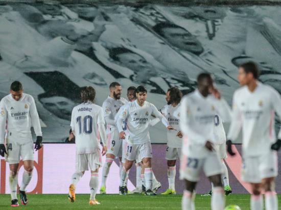 Real Madrid break down stubborn Getafe to close gap on Atletico