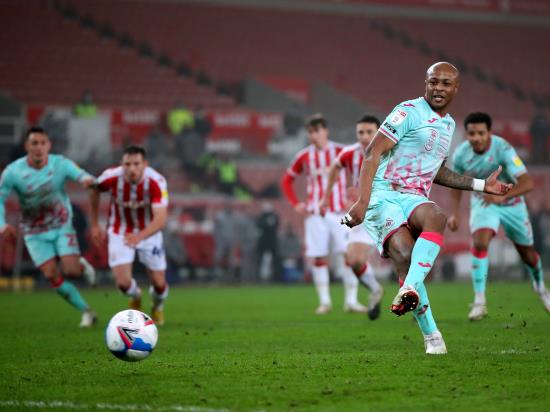 Andre Ayew spot on as Swansea snatch late win at Stoke to boost promotion hopes