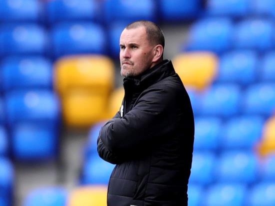 AFC Wimbledon boss Mark Robinson delighted with win over 10-man Ipswich