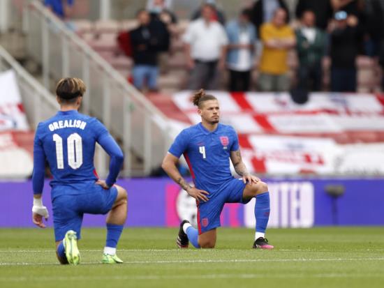 England labour to win over Romania after fans again boo players taking a knee