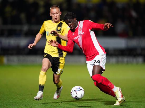 Morecambe striker Arthur Gnahoua expected to miss FA Cup tie with Newport