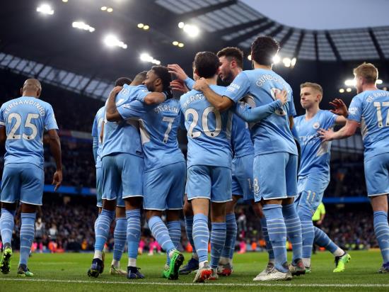 Manchester City recover from Leicester scare to move six points clear