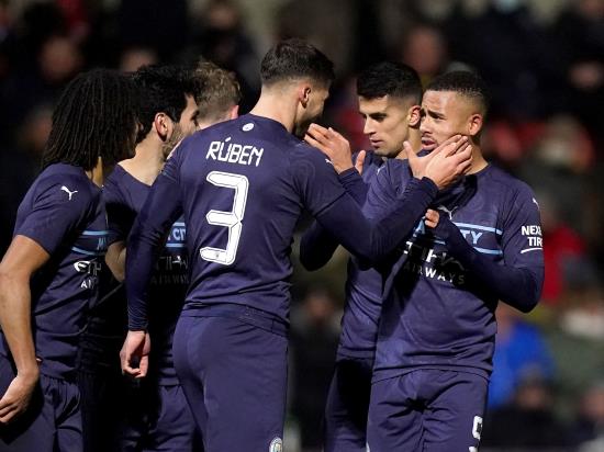 Strong Manchester City side ease past Swindon in FA Cup