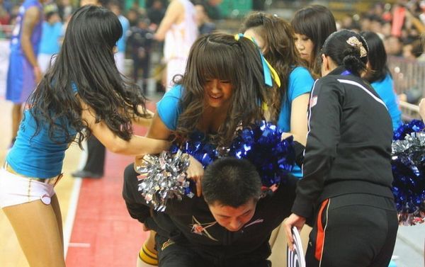 Injured basketball baby is carried off court