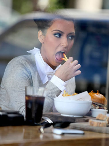 Kim pigs out after gym trip