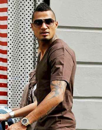 AC Milan player - Kevin Prince Boateng had a walk with his family