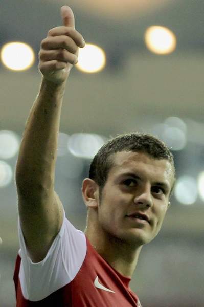 Fabio Capello faces a showdown with Arsene Wenger if he picks Jack Wilshere