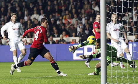 Vidic warns City that the title is far from over as United keep chase