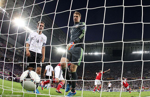 Denmark 1 Germany 2: Danes heading home as ton-up Podolski sets up Greece clash