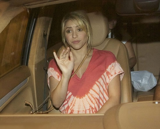 She's no WAG! Shakira films new video in Barcelona as boyfriend Gerard Pique heads to Euro 2012 semi-final after Spain victory