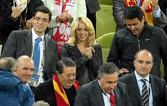 She's no WAG! Shakira films new video in Barcelona as boyfriend Gerard Pique heads to Euro 2012 semi-final after Spain victory