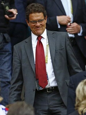 Roo only play for Fergie! Capello takes swipe at England flop Wayne