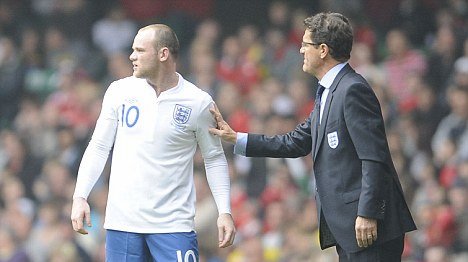 Roo only play for Fergie! Capello takes swipe at England flop Wayne
