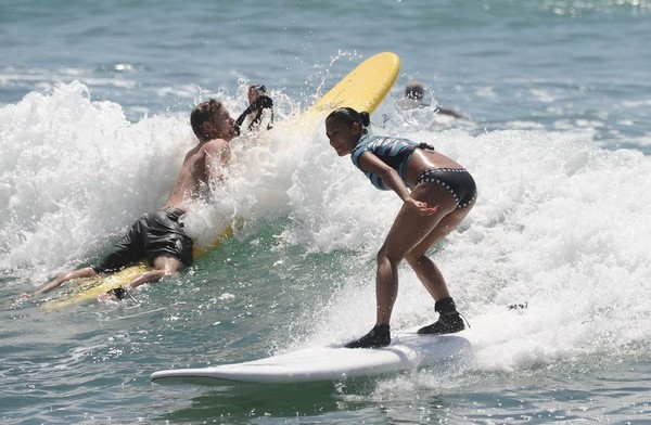 Lewis Hamilton's girlfriend goes surfing