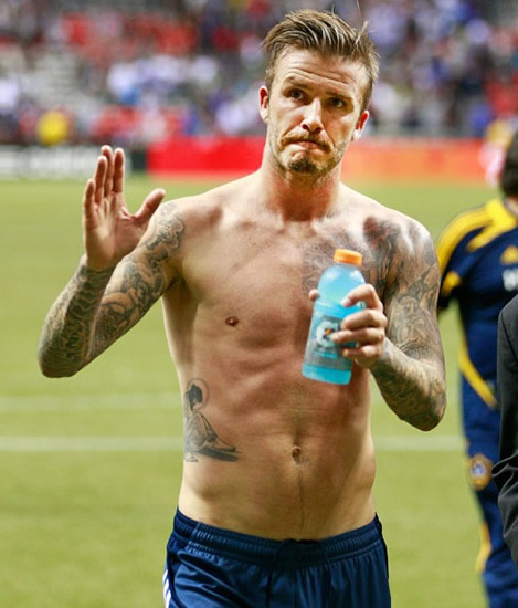 Becks treats fans to topless walkabout - Torso display after saving team from defeat