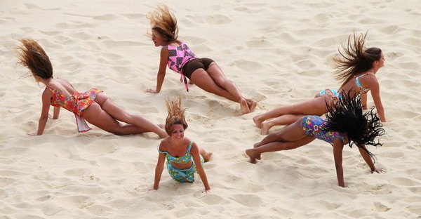 “Beach babes” display their virginal beauty in a dance