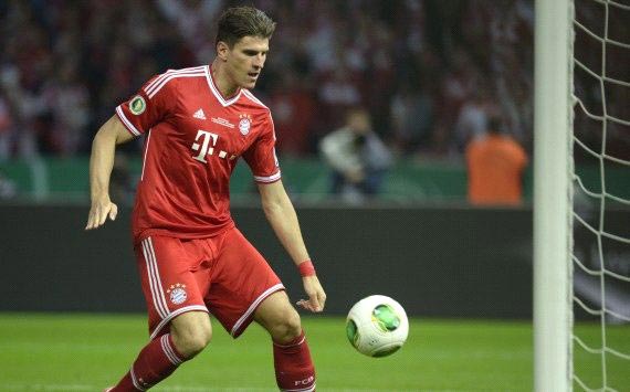 Bayern Munich 3-2 Stuttgart: Gomez at the double as Bavarians survive Schwaben fightback to complete treble