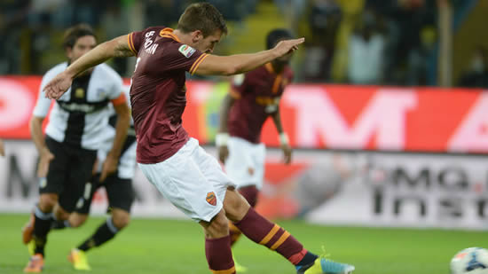 Roma fight back to move joint-top