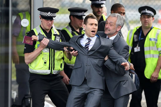 Joker Lee Nelson poses as England star before airport security notice and chuck him out