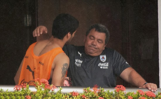 A broken-looking Luis Suarez pictured at Uruguay team hotel after learning of his 4-month ban from football