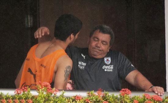 A broken-looking Luis Suarez pictured at Uruguay team hotel after learning of his 4-month ban from football