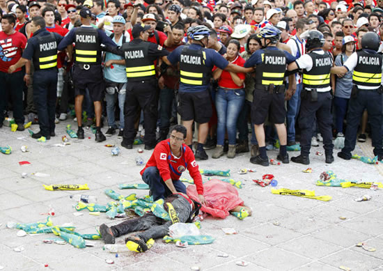 Costa Rica fans left lying in pools of blood at fan park