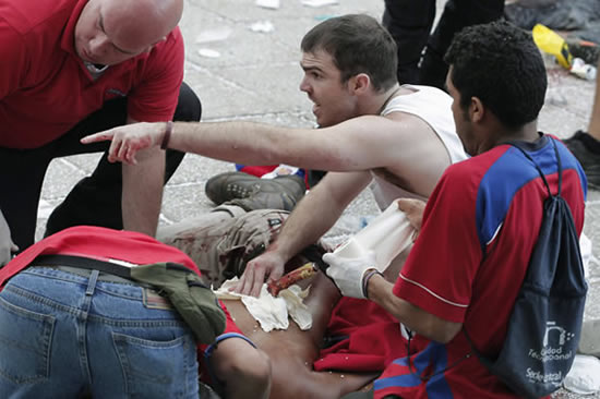 Costa Rica fans left lying in pools of blood at fan park