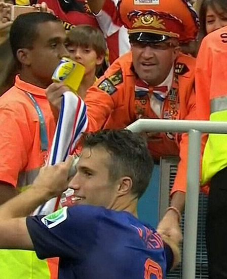 Robin van Persie gave his medal & captain’s armband to Dutch super fan the Oranje Generaal