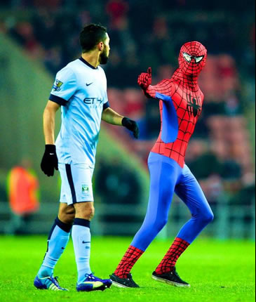 Pitch invader dressed as Spiderman stopped play during Sunderland v Man City