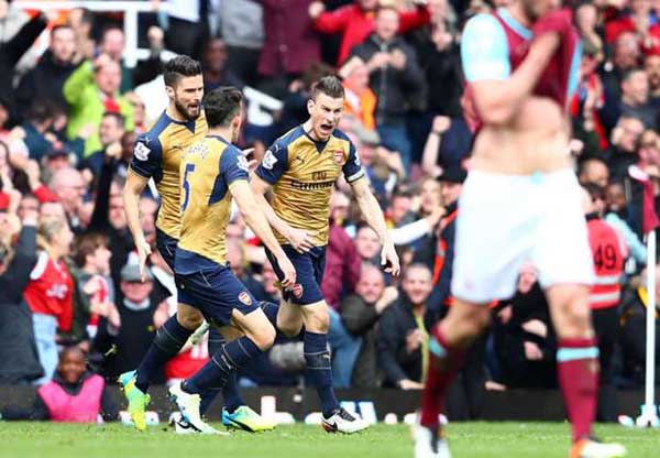 West Ham 3-3 Arsenal: Koscielny rescues Gunners after Carroll hat-trick