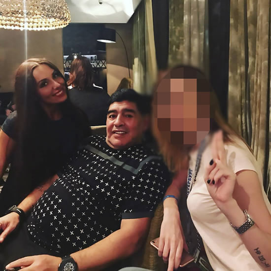 Diego Maradona denies ripping off journalist's dress during hotel interview