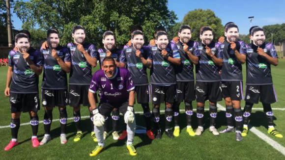 Argentine players pose in Lionel Messi masks to say thank you