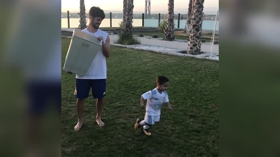 Isco playing with his son