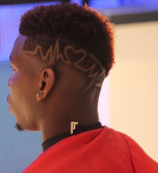 Manchester United star Paul Pogba honours his return from injury with a fitting new haircut